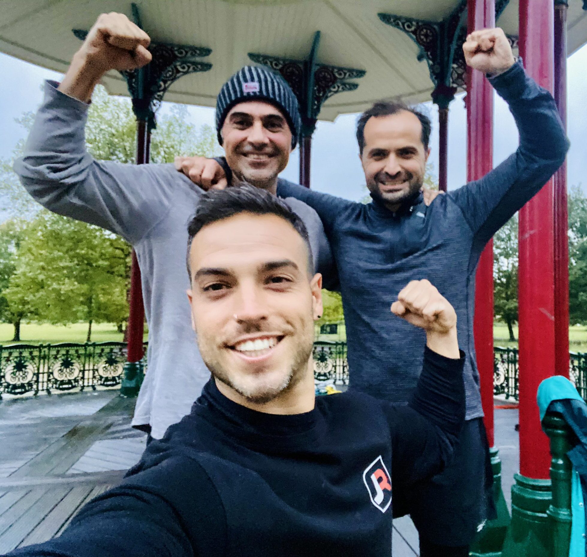 Outdoor personal training in Clapham Common with Jorge Rojo and two clients at the Bandstand